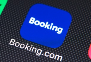 Booking reports a net loss of $55 million but a 62% increase in air tickets