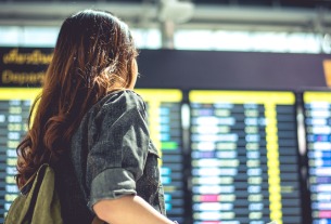 China shortens COVID quarantine times, eases flight curbs