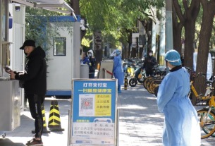 Beijing shuts parks, Shanghai tightens entry as China COVID cases rise
