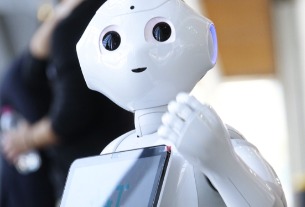 Cost, Covid-19 drive Chinese hotels into arms of service robots