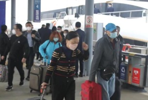 China reopens borders in final farewell to zero-COVID