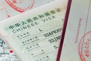 China issuing visas for some Japan travelers despite halt