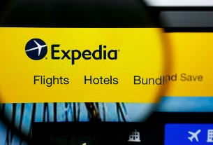 Expedia profit misses as severe weather weighs on holiday quarter, shares fall